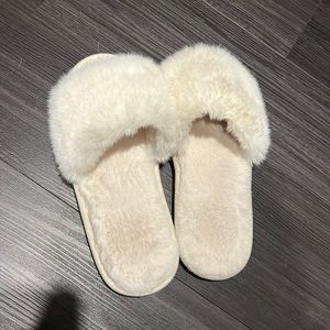 White fuzzy slippers